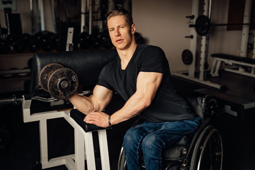 Man performing dumbbell hammer curl for arm workout