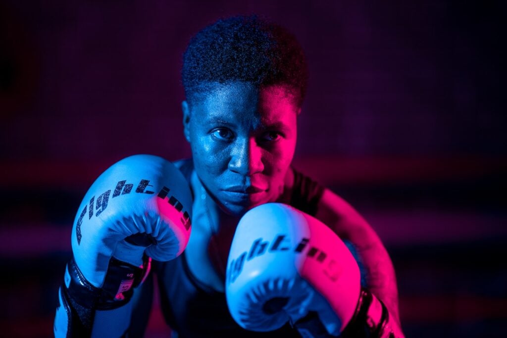 Boxer in a ready stance, demonstrating basic boxing training techniques.