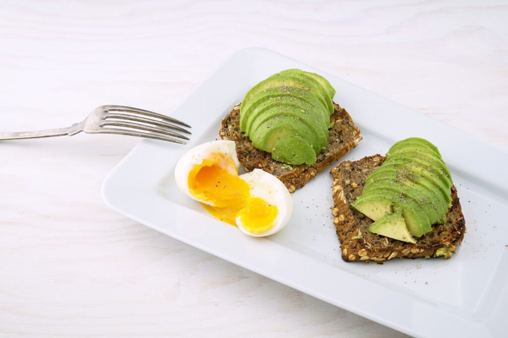 A balanced plate featuring various types of carbohydrates like whole grains, fruits, and vegetables.