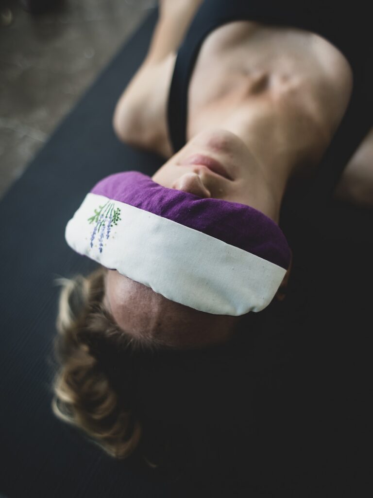 Woman practicing yoga breathing techniques to alleviate anxiety