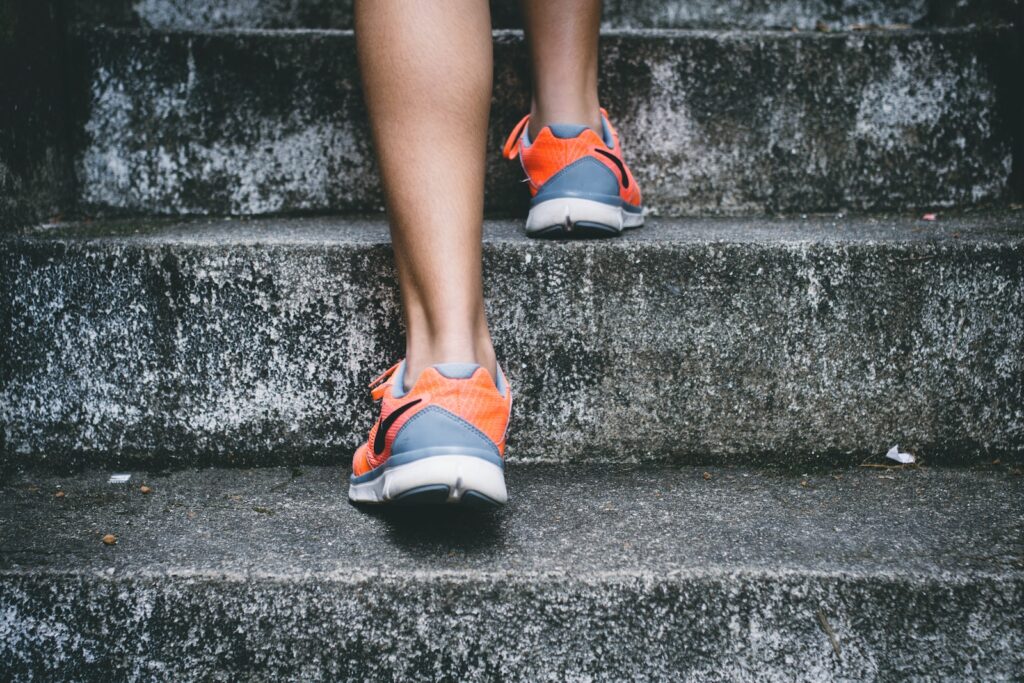 Man climbing stairs for weight loss and fitness